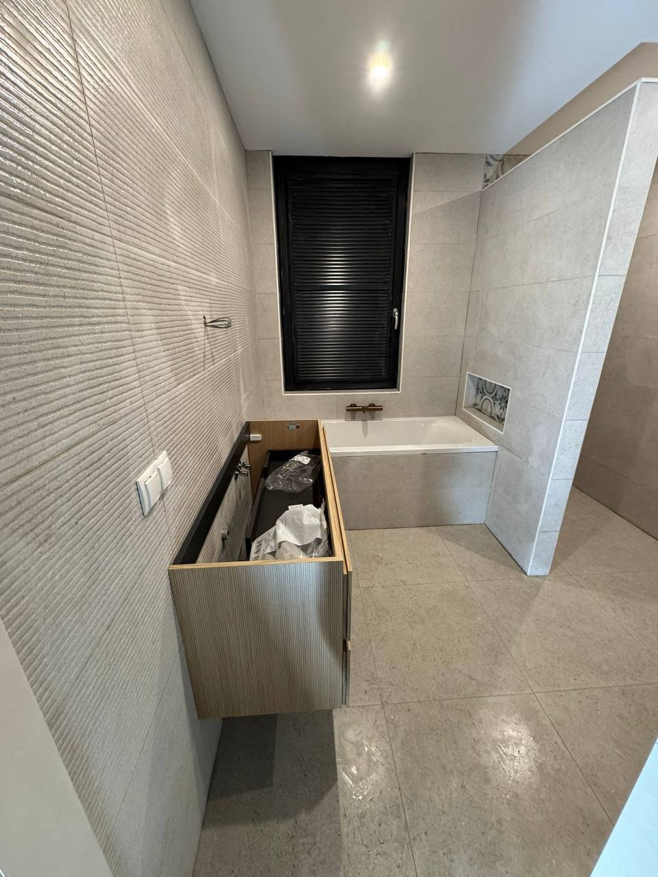 Moderne badkamerafwerking na renovatie